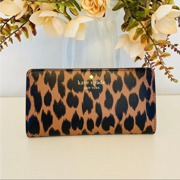 kate spade Handbags - Kate Spade Schuyler Large Slim Bifold Wallet Leopard NWT